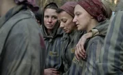 Anna Próchniak as Gita Furman & Mili Eshet as Ivana & Tallulah Haddon as Hanna in the Death March from Auschwitz. January 1945.