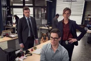 Detective Valérie Bertrand (CAROLE BIANIC) and Detective Charlie Hudson (JOHN REARDON) watch as Jesse Mills (JUSTIN KELLY) works his magic