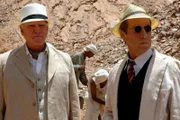 L-R: Nathan Cairns (Malcolm McDowell), Morgan Sinclair (Jonathan Hyde)