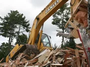 The demolition of the mansion.