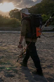 Max using metal detector.