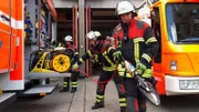 Firefighters are preparing to put out the fire.
