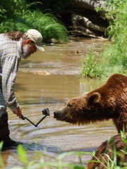 Jeff shows bear the Go-Pro.