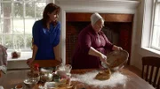 Rebecca watching Mary bake pastries.