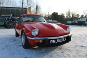 NORWICH, UNITED KINGDOM - The Triumph GT6 stands proudly in the snow after its Car SOS restoration.