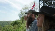 The Raneys look out onto the Ozark Mountains.