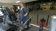 Nikki works out with a personal trainer.