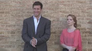 Werner and Debra stand together.