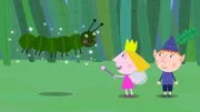 Holly lässt die kleine Raupe mit Zauberei fliegen.