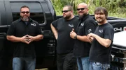 Doogie, Chasey, Porter and Brannon by their trucks.