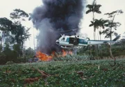 Colombia - Colombian National Police in helicopter leave a lab destroyed in tandem with the DEA. (Steve Murphy and Javier Pena)