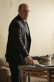 Carl Elias (Enrico Colantoni)