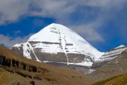 Tibetan Buddhism sacred snow-covered mountain peak of Kailash south side with channel Gang Rinpoche Gang Tise Mountains Trans-Himalaya Himalayas Tibet Autonomous Region People’s Republic of China Asia.