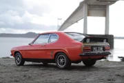 A pristine Ford Capri by the Severn Bridge.