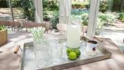 A close up of the serving tray on the dining room table in the formal dining room of the newly renovated Ferguson home, as seen on Fixer Upper. (after)