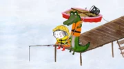 Rita ist eine sehr gute Anglerin, das will sie dem Krokodil beweisen.