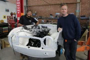 Tim and Fuzz at the workshop with the Triumph
