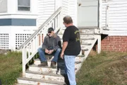 Durham, NH: Brian Gurry takes a break and consults with Lee Danley.