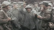 November 1916. By the end of the Battle of the Somme, 72,000 Germans have been taken prisoner by Allied forces. For them, the war is over, which makes some of them very happy. Here, a soldier exchanges his hat for an English helmet and waves to the camera.  (photo credit: Imperial War Museum)
