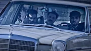 Drei Männer in einem Auto