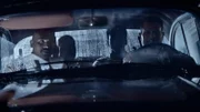 Vier Männer in einem Auto