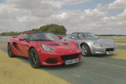 Hethel, Norwich, England  - (Left) Red Lotus Elise S2, and (right) silver Lotus Elise S1
