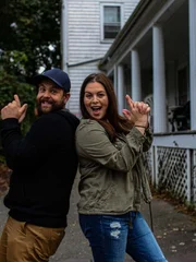 Jack Osbourne and Katrina Weidman pose with Hand Air Guns in front of Taylor Trask Museum
