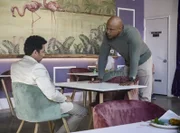 L-R: Lionel Fernandez (Oscar Nuñez) and Special Agent Sam Hanna (LL COOL J).