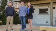 Real estate agent "Red" Ryan Lowrie poses for a photo with homebuyers Ryan and Samantha after touring the Beach Path House, as seen on HGTV's Beach Hunters.