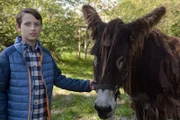 Der introvertierte Tom (Nemo Frenzel) will unbedingt seinen Poitou-Esel Portos behalten.