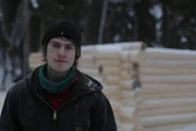 Charlie Jagow outside of his future cabin.