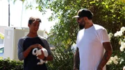 Host Antonio Ballatore talks with Mason Mits as he holds a rabbit.