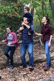 Jim and his family are hiking.