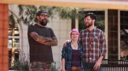 Host ANTONIO BALLATORE and homeowners SCOUT RASKIN and ROBBY DEFRAIN look at the new backyard.