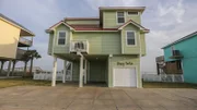 The exterior of the Bay Shore House in Galveston, Texas, as seen on HGTV's Beach Hunters.