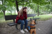 Amber Oliver & her dog demonstrating how if you are sad dos will react to your emotions and try to comfort you.
