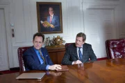 On left: Tony Silvercreek (Dean Winters) and on right  Robert (Thomas Haden Church).