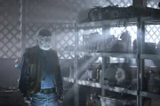 Old man in garage.