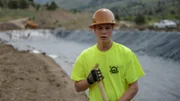 Hunter Hoffman standing on the claim with the new pond lining.