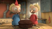 Die kleinen Besucher Tofslan (l.) und Vifslan (r.) nehmen sich den Schokoladenkuchen vor.
