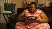 June eating in her living room.