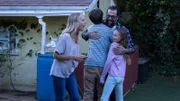 Owen and Audrey Vogel hug host Ballatore as their mother Darlene Vogel looks excited.