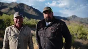 Freddy Dodge and Juan Ibarra to camera with desert in background