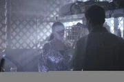 Brinn and Betty talking in garage.