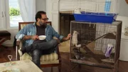 Antonio Ballatore waits for the Diaz family to return, he plays with the chinchillas in their cage.