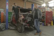 Tim, Fuzz and Vicky pose with the car in the workshop