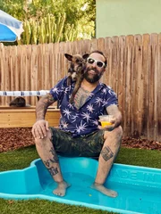 Antonio Ballatore with dog and pool