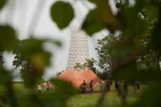 Ethiopian Architecture students assemble  the components of a tower that is designed by Italian Architect Arturo Vittori to collect drinking water from fog in a Dorze village in Ethiopia.â€¨â€¨â€¨(photo credit:  National Geographic Channels/Brendan Bannon)