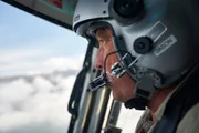 Simrik Air pilot Jason Laing at the controls of B3 helicopter, over Lukla Nepal.