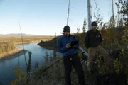 Crewmember talking with Bob Harte about his Alaska adventures.